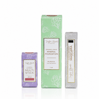 Taylor Made Organics Clean Beauty Bundle with Multistick, Blissful Liquid Mineral Foundation, and Mascara boxes.