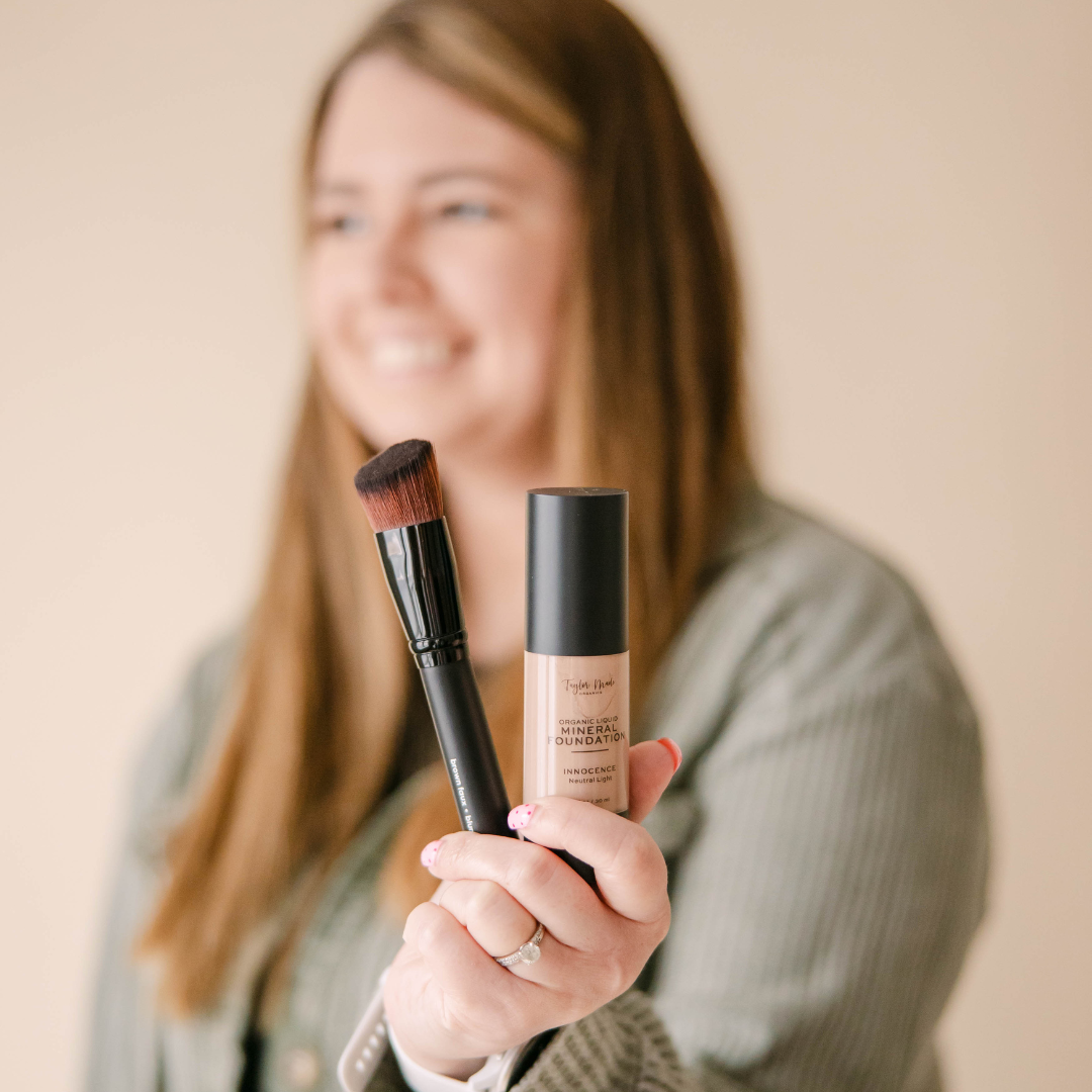Taylor holding Liquid Mineral Foundation and Blurring Concealer Brush | Taylor Made Organics
