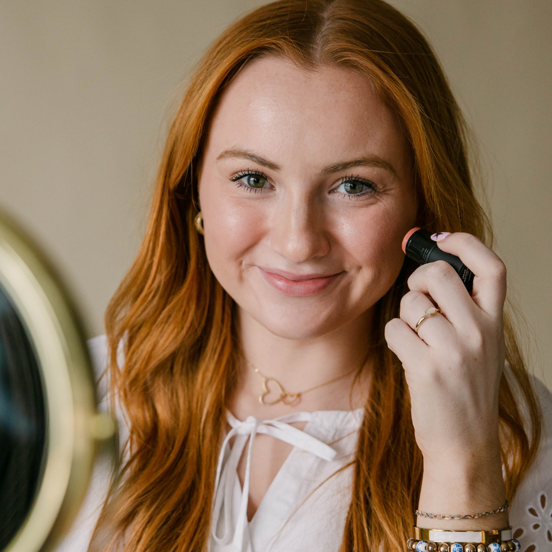 Applying multistick shade Terracotta on cheeks | Taylor Made Organics